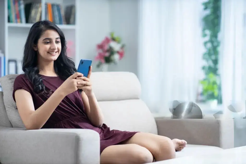 Young woman sofa sitting at home